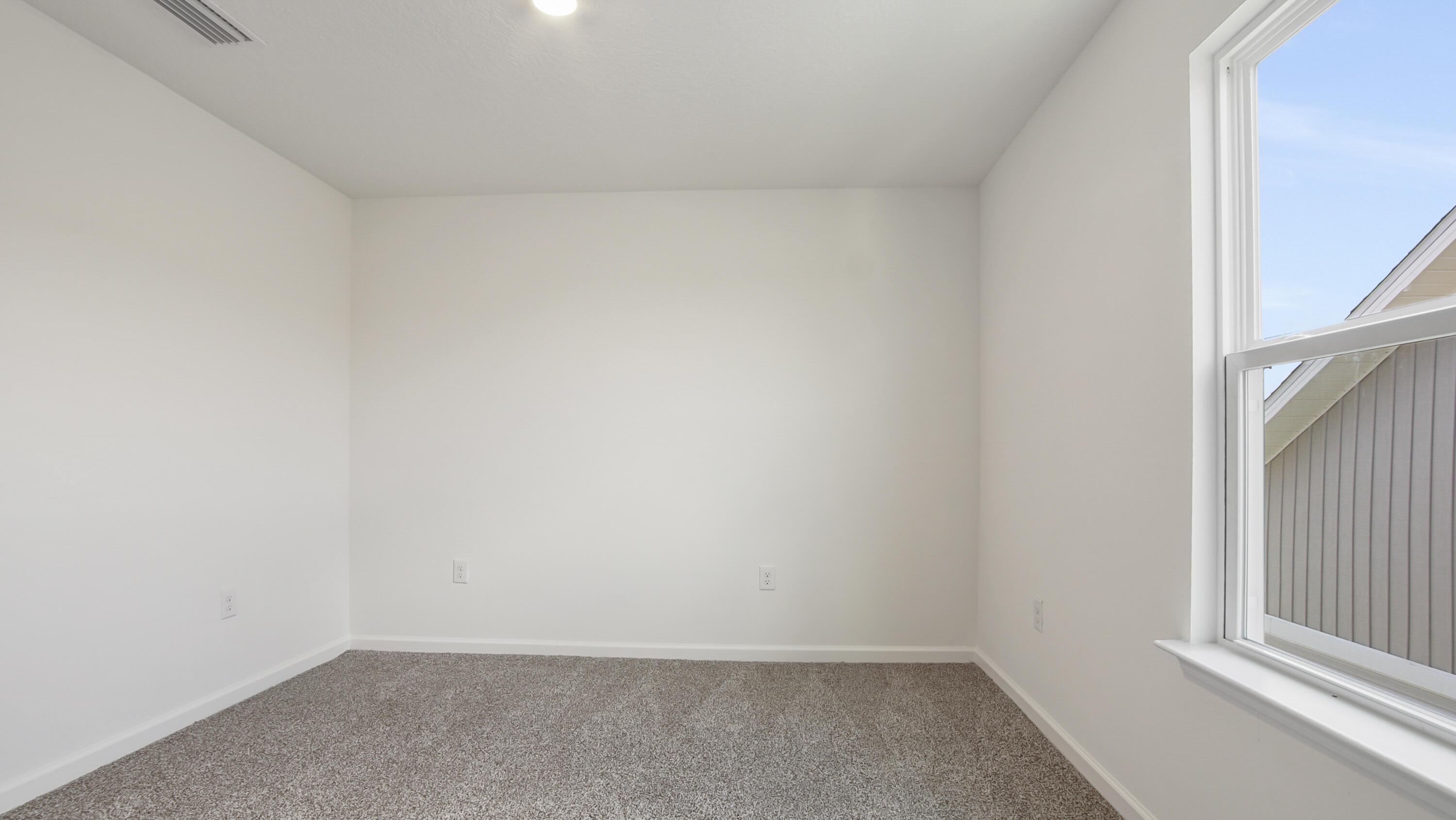 206 Huckleberry Street Freeport, FL 32439 - Photo 29 of 36 a view of an empty room