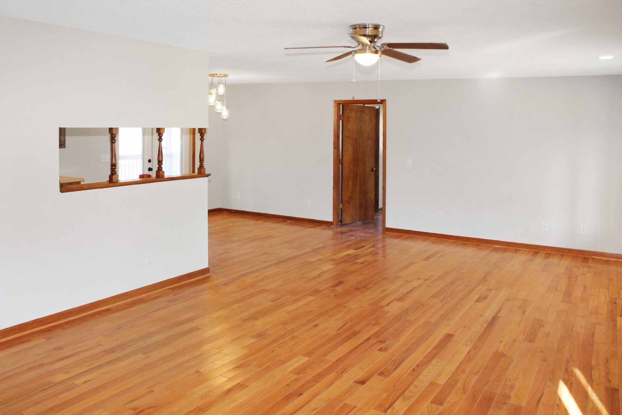 209 Pete Sain Road Manchester, TN 37355 - Photo 6 of 18 wooden floor in an empty room with a window