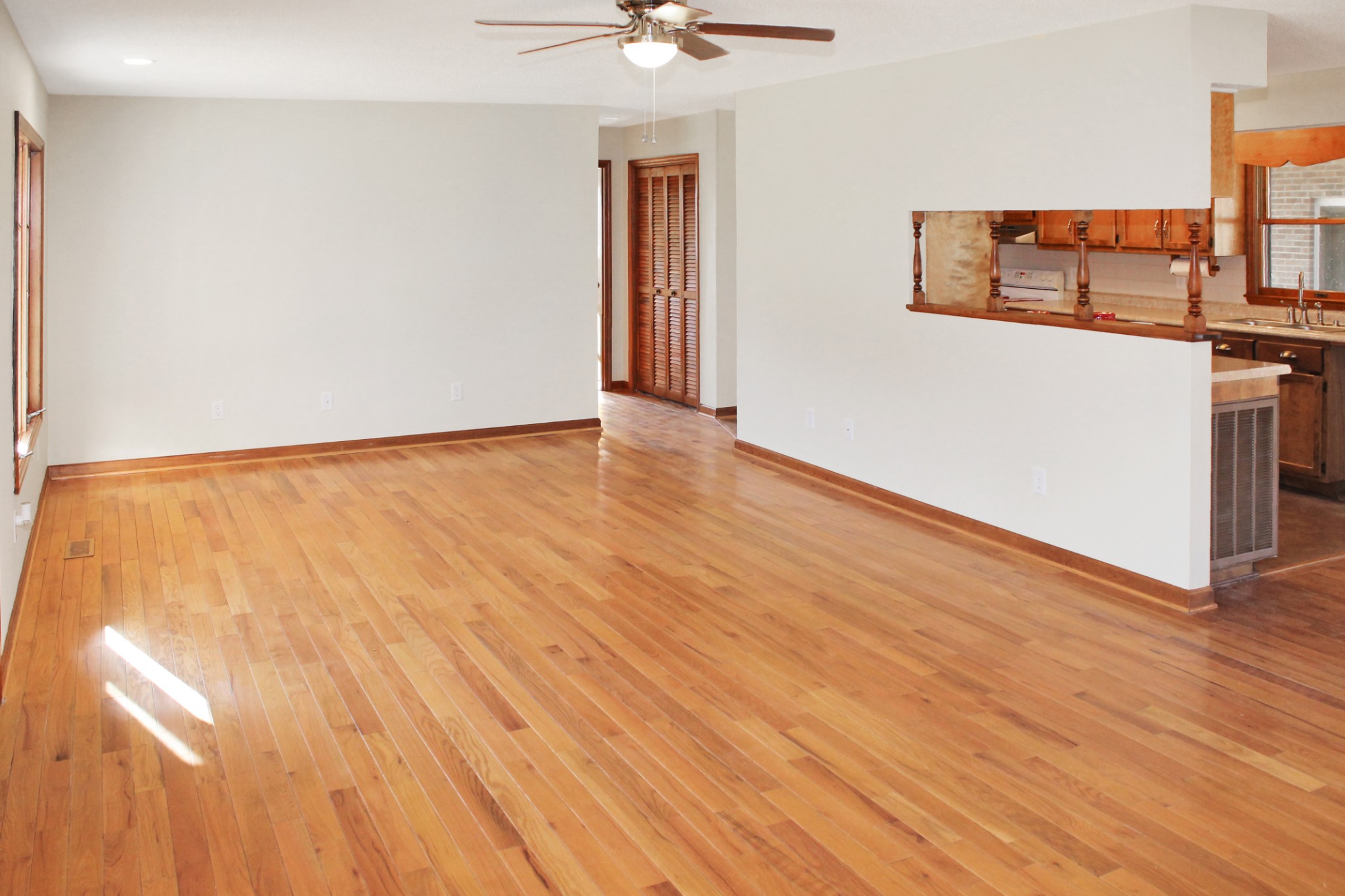 209 Pete Sain Road Manchester, TN 37355 - Photo 7 of 18 a view of a room with wooden floor and ceiling fan