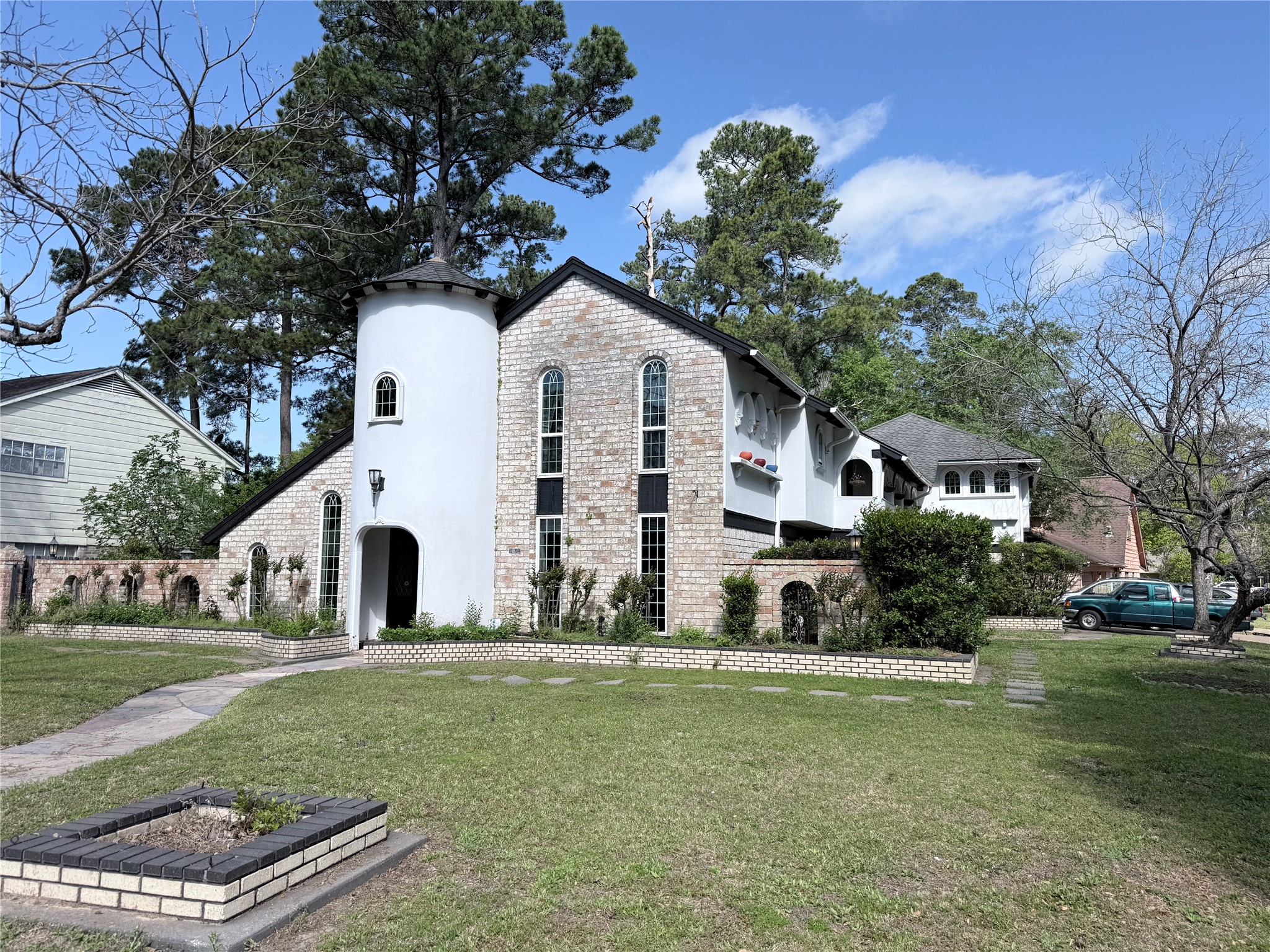 3802 Midforest Drive Houston, TX 77068 - Photo 1 of 31 a view of a white house with a yard
