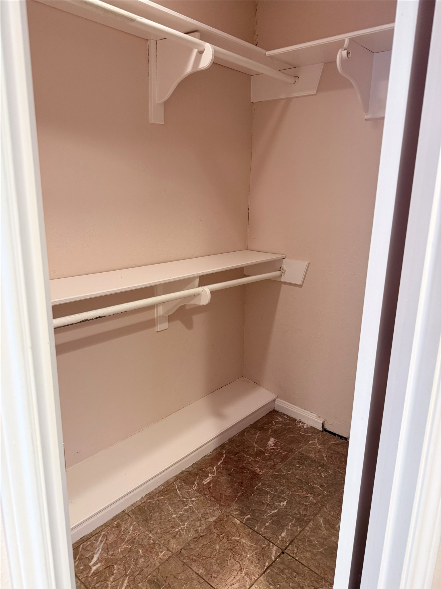 3802 Midforest Drive Houston, TX 77068 - Photo 15 of 31 a view of small space with racks on the wall