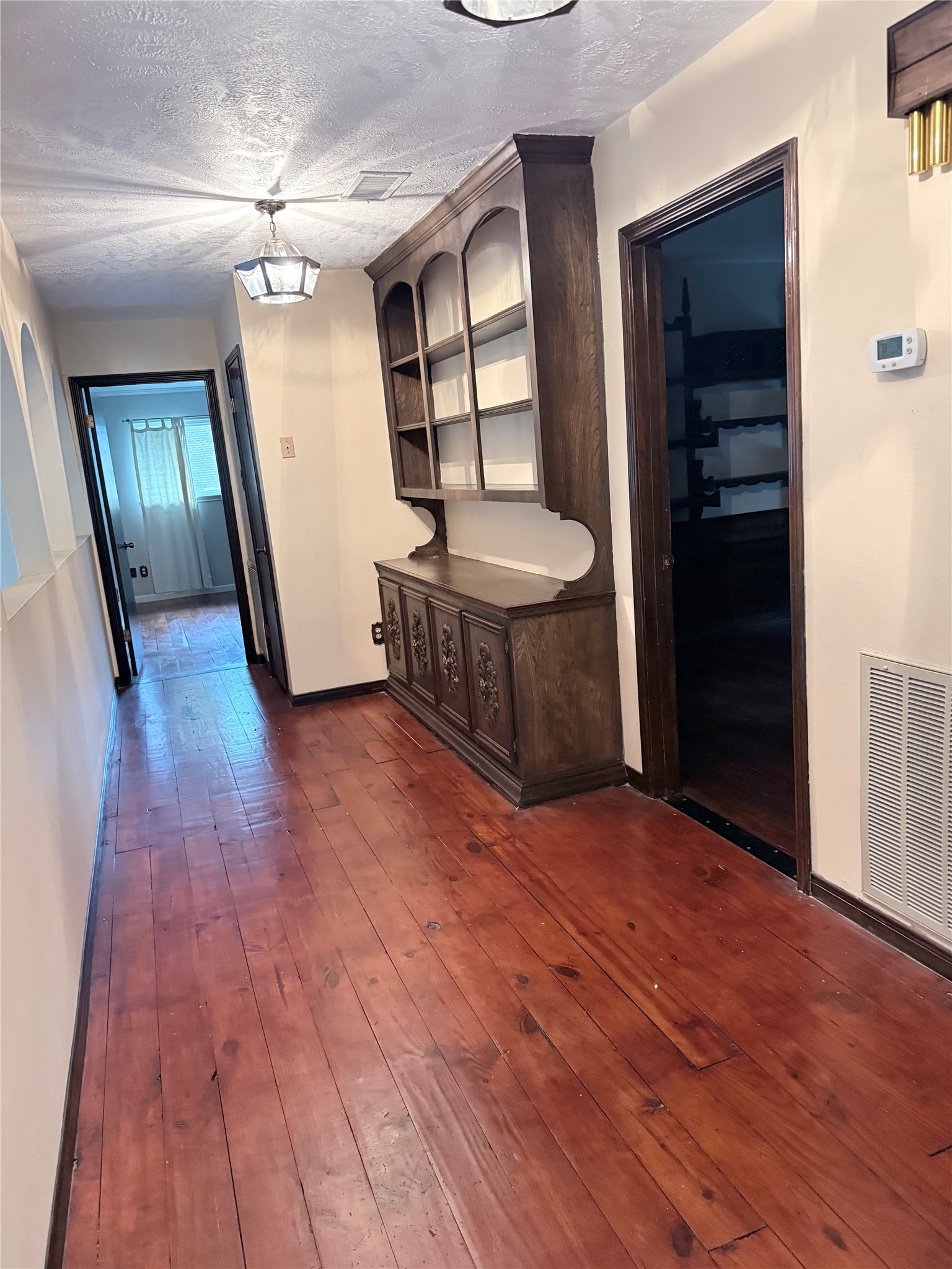 3802 Midforest Drive Houston, TX 77068 - Photo 18 of 31 wooden floor in an empty room with a window