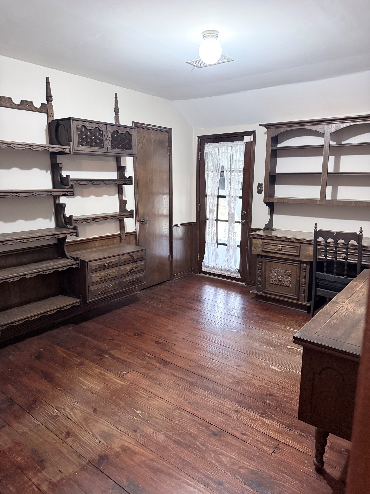 3802 Midforest Drive Houston, TX 77068 - Photo 25 of 31 a view of a room with wooden floor and windows