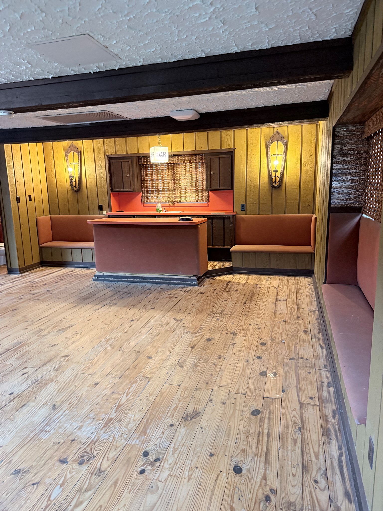 3802 Midforest Drive Houston, TX 77068 - Photo 28 of 31 a room with wooden floor and windows