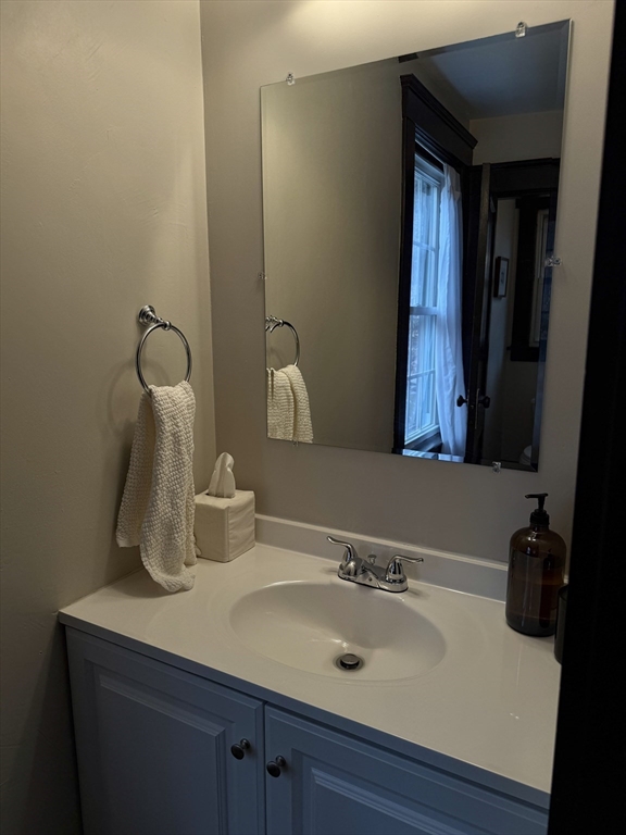 27 Breakneck Hill Road, Unit 27 Southborough, MA 01772 - Photo 15 of 25 a bathroom with a sink and a mirror