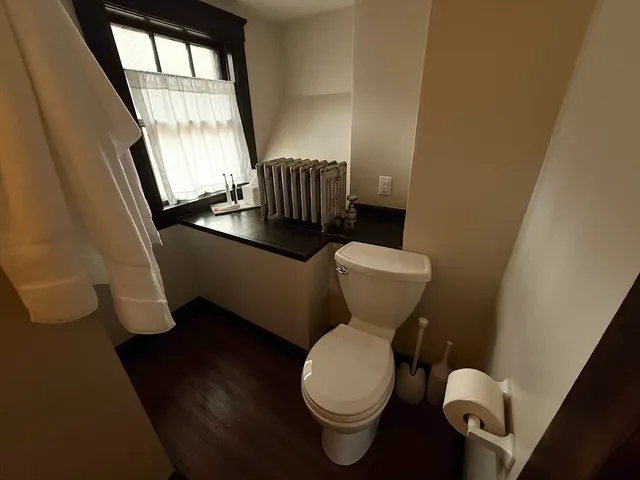 a bathroom with a tub and sink