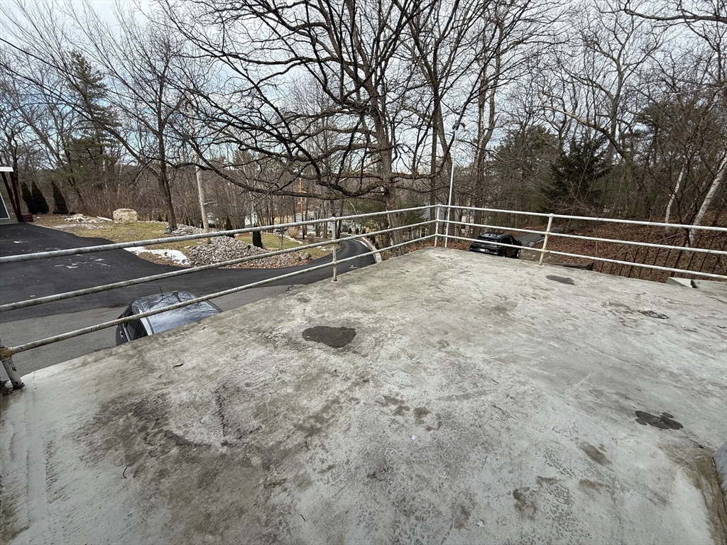 27 Breakneck Hill Road, Unit 27 Southborough, MA 01772 - Photo 25 of 25 a view of backyard with trees
