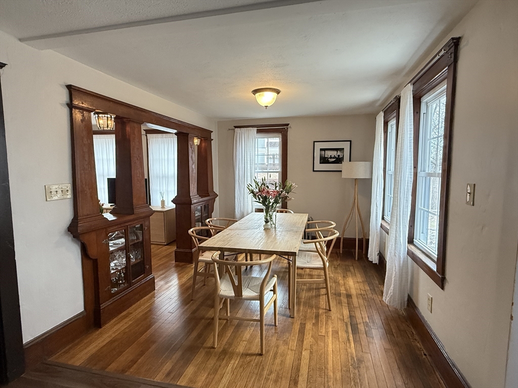 27 Breakneck Hill Road, Unit 27 Southborough, MA 01772 - Photo 6 of 25 a view of a dining room with furniture window and wooden floor