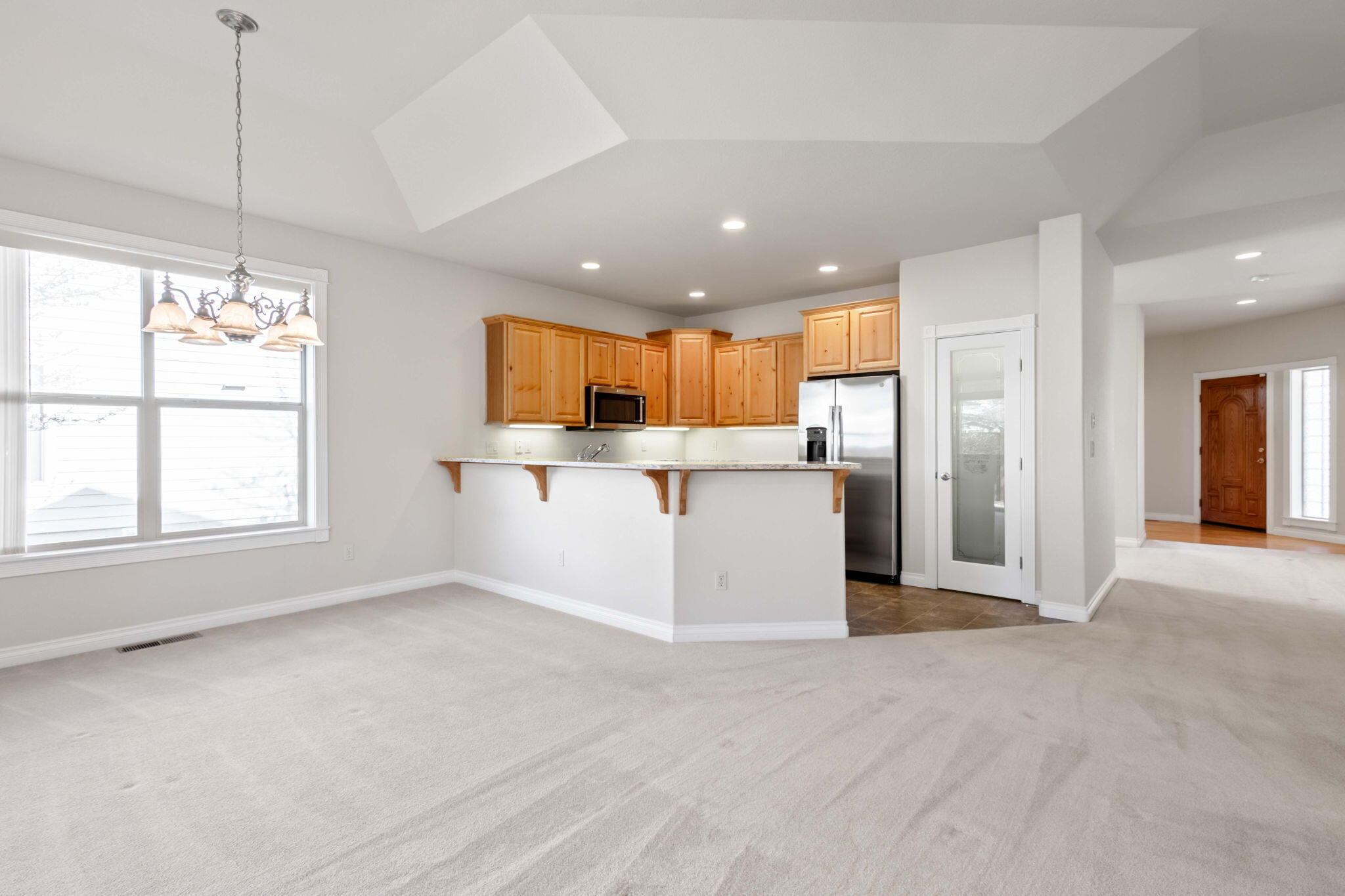 1726 Northwest Cliffside Way Redmond, OR 97756 - Photo 11 of 36 a view of a kitchen with refrigerator and window