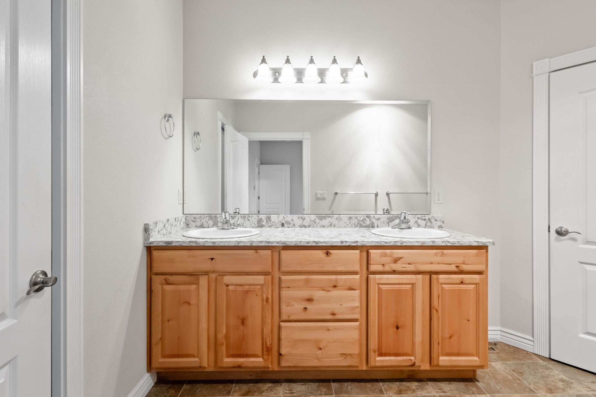1726 Northwest Cliffside Way Redmond, OR 97756 - Photo 20 of 36 a bathroom with a granite countertop sink and a mirror
