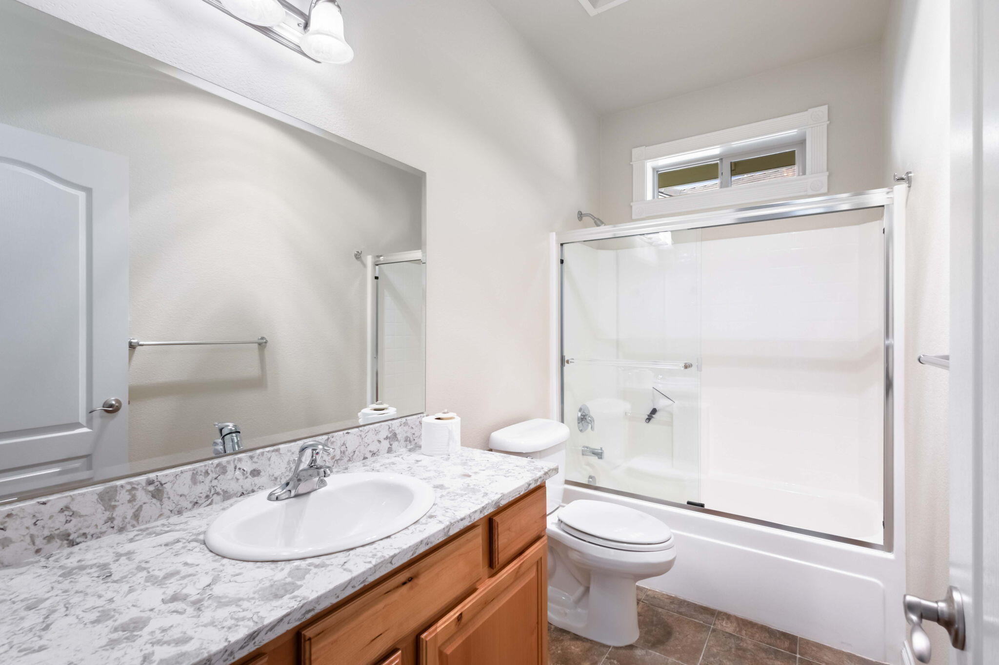 1726 Northwest Cliffside Way Redmond, OR 97756 - Photo 24 of 36 a bathroom with a granite countertop sink toilet and shower