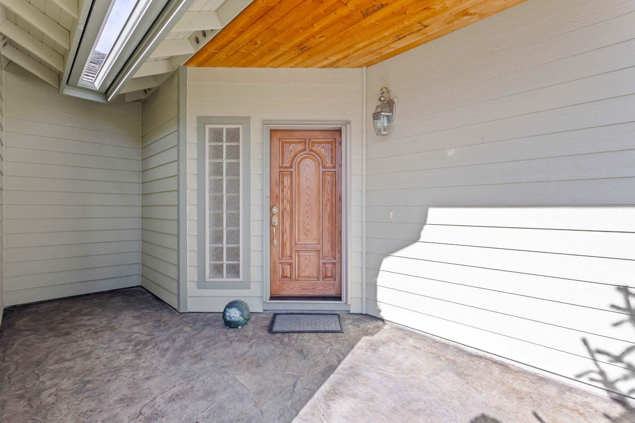 1726 Northwest Cliffside Way Redmond, OR 97756 - Photo 3 of 36 a view of a house with a barbeque and wooden fence