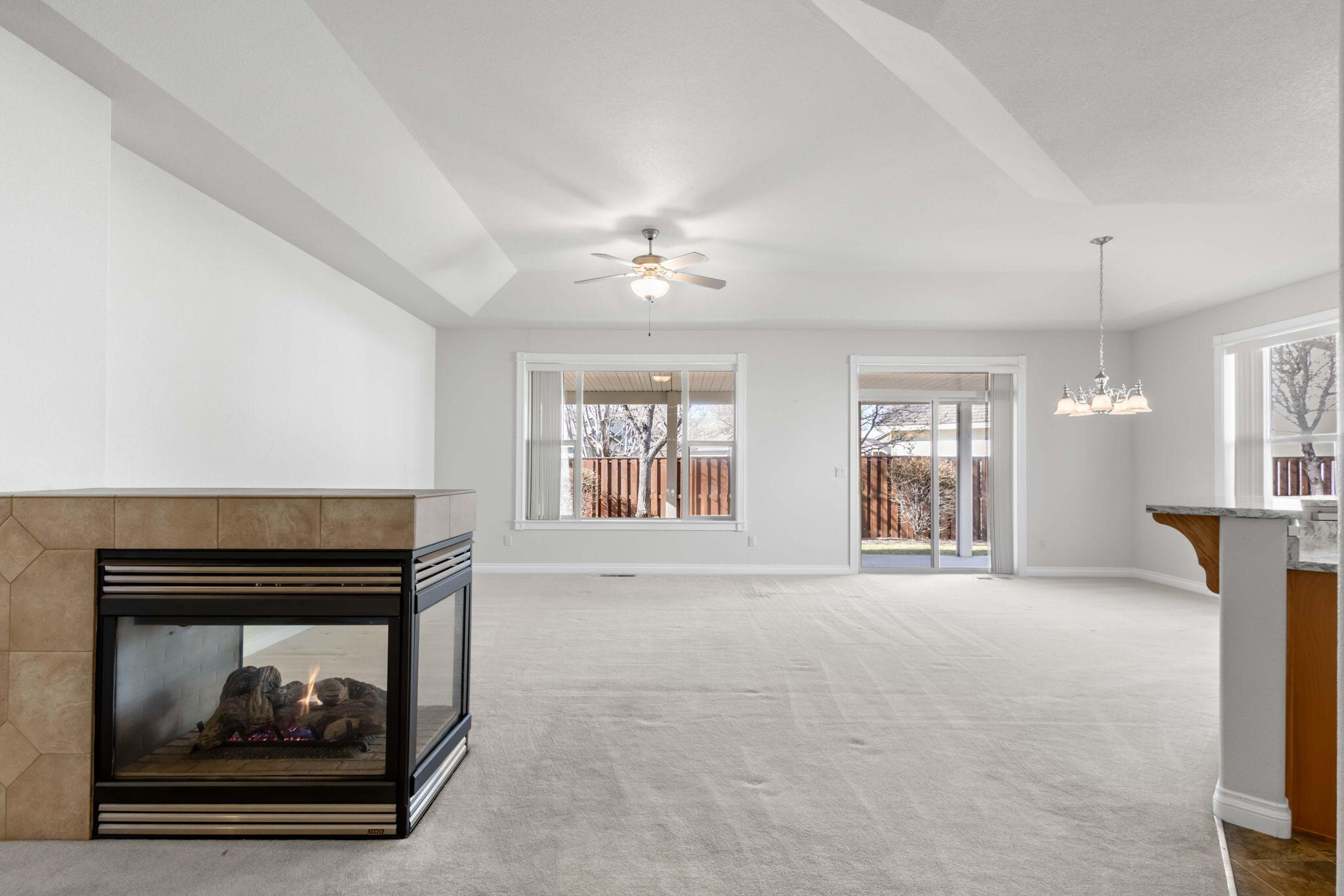1726 Northwest Cliffside Way Redmond, OR 97756 - Photo 6 of 36 a living room with furniture and a fireplace