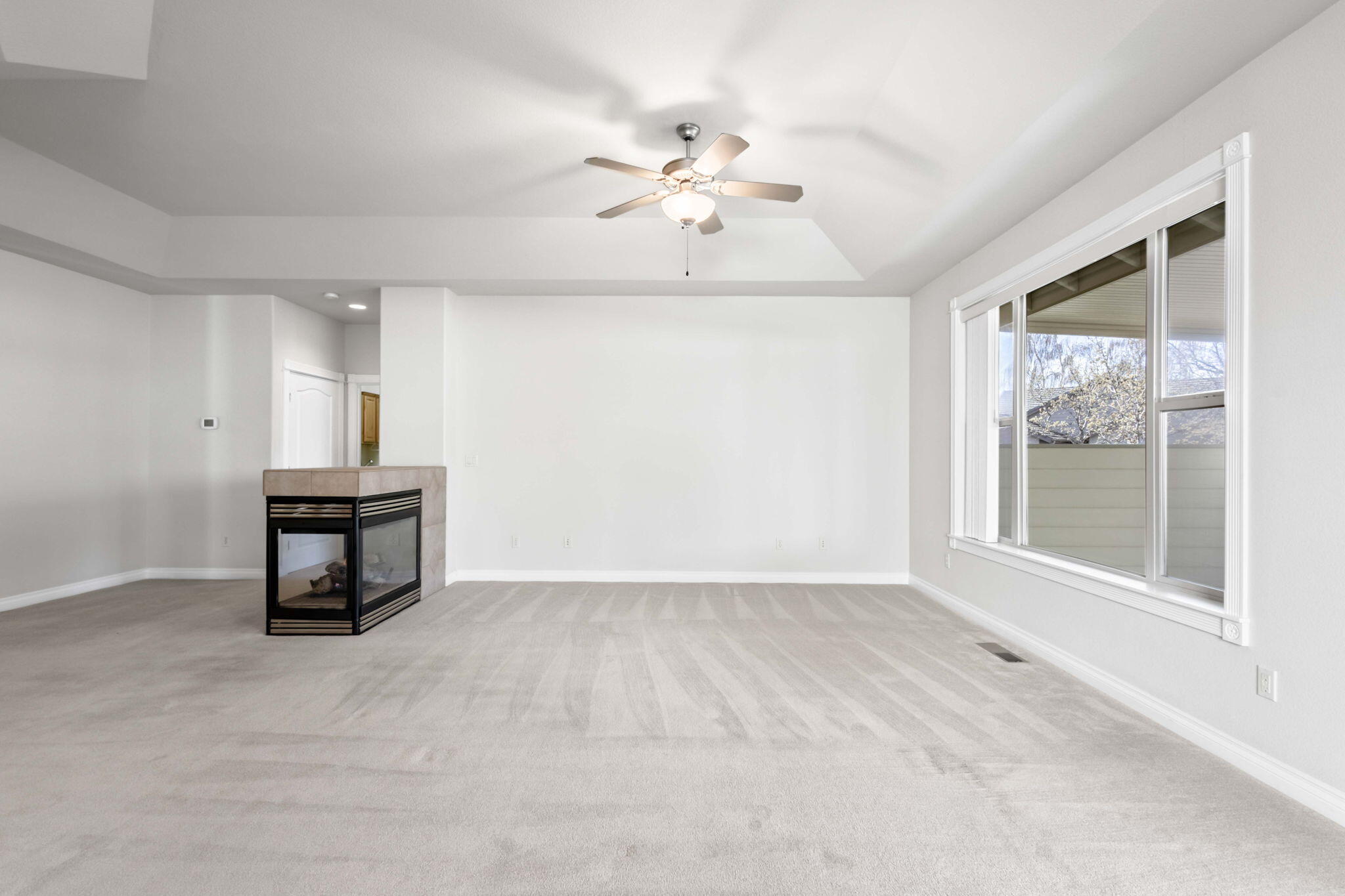 1726 Northwest Cliffside Way Redmond, OR 97756 - Photo 7 of 36 a view of an empty room with a window