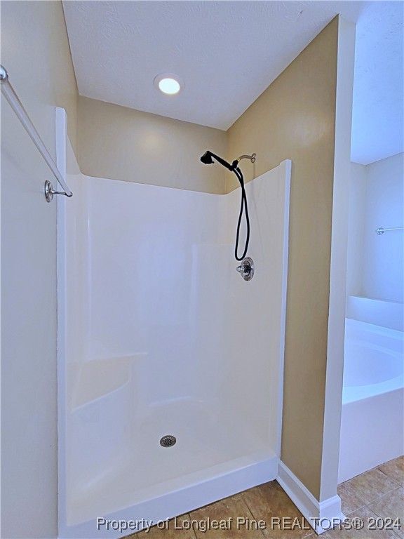 235 Chestnut Drive Raeford, NC 28376 - Photo 32 of 50 a bathroom with a shower