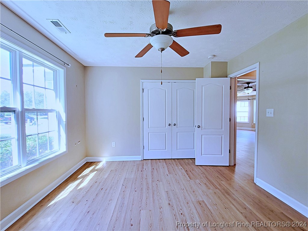 235 Chestnut Drive Raeford, NC 28376 - Photo 34 of 50 a view of room with hardwood floor and window