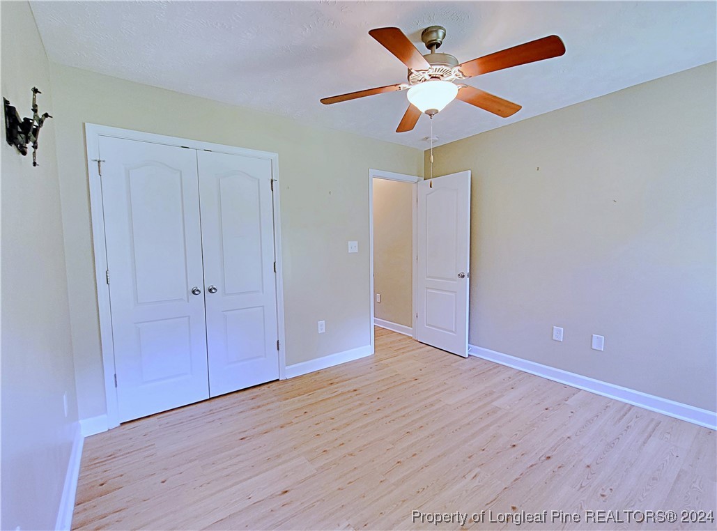 235 Chestnut Drive Raeford, NC 28376 - Photo 43 of 50 wooden floor in an empty room