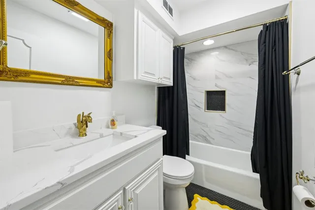 a view of a yard with plants and trees