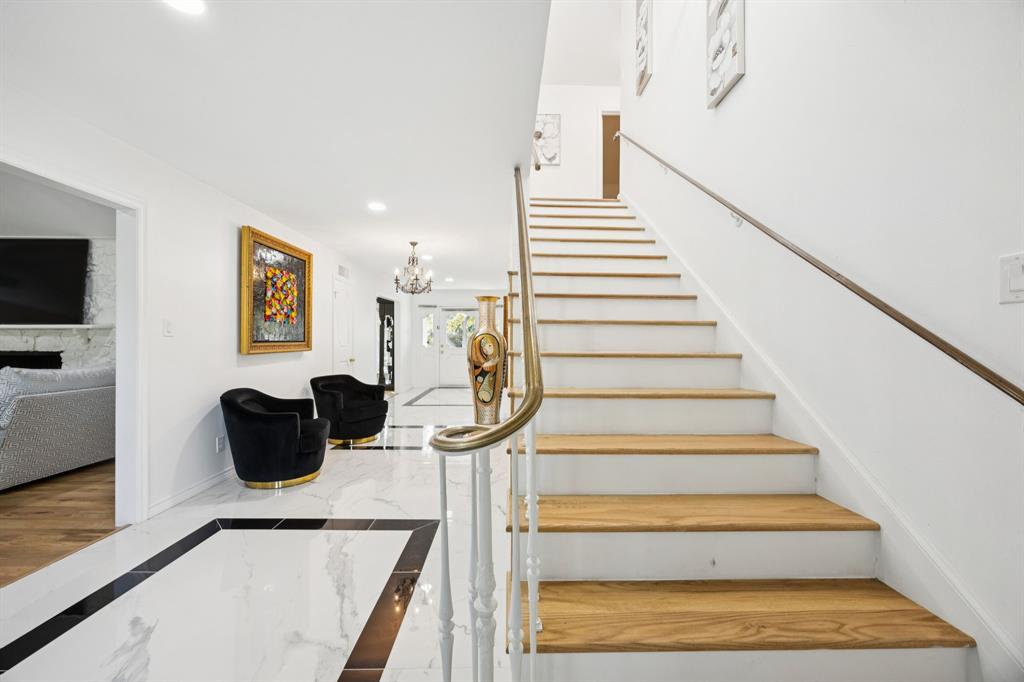 11212 Inwood Road Dallas, TX 75229 - Photo 5 of 36 a view of entryway and hall with wooden floor