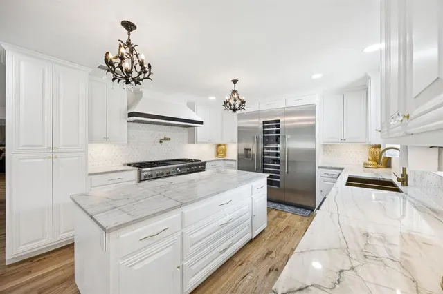 a living room with furniture fireplace and flat screen tv