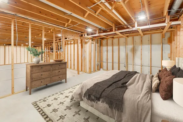 a bed room with a bed and a window