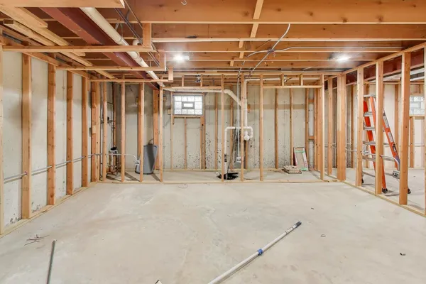 a view of an empty room with stairs