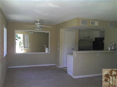 72724 Eagle Road, Unit 3 Palm Desert, CA 92260 - Photo 2 of 11 a view of livingroom with window