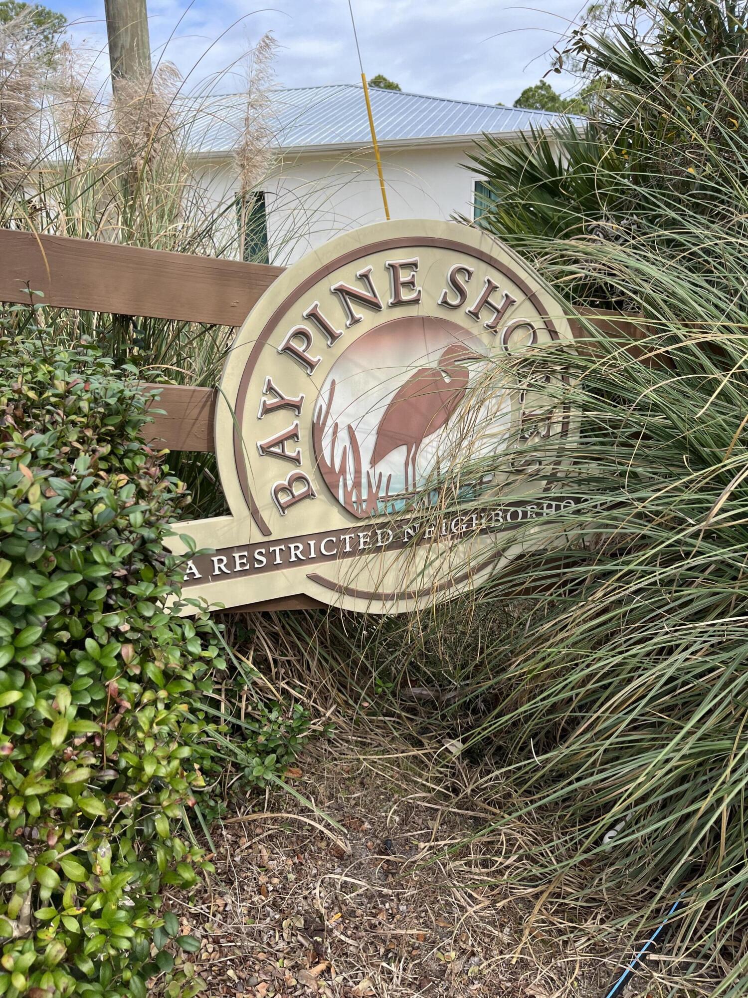 431 Pisces Drive Santa Rosa Beach, FL 32459 - Photo 19 of 19 a sign that is on the side of a building