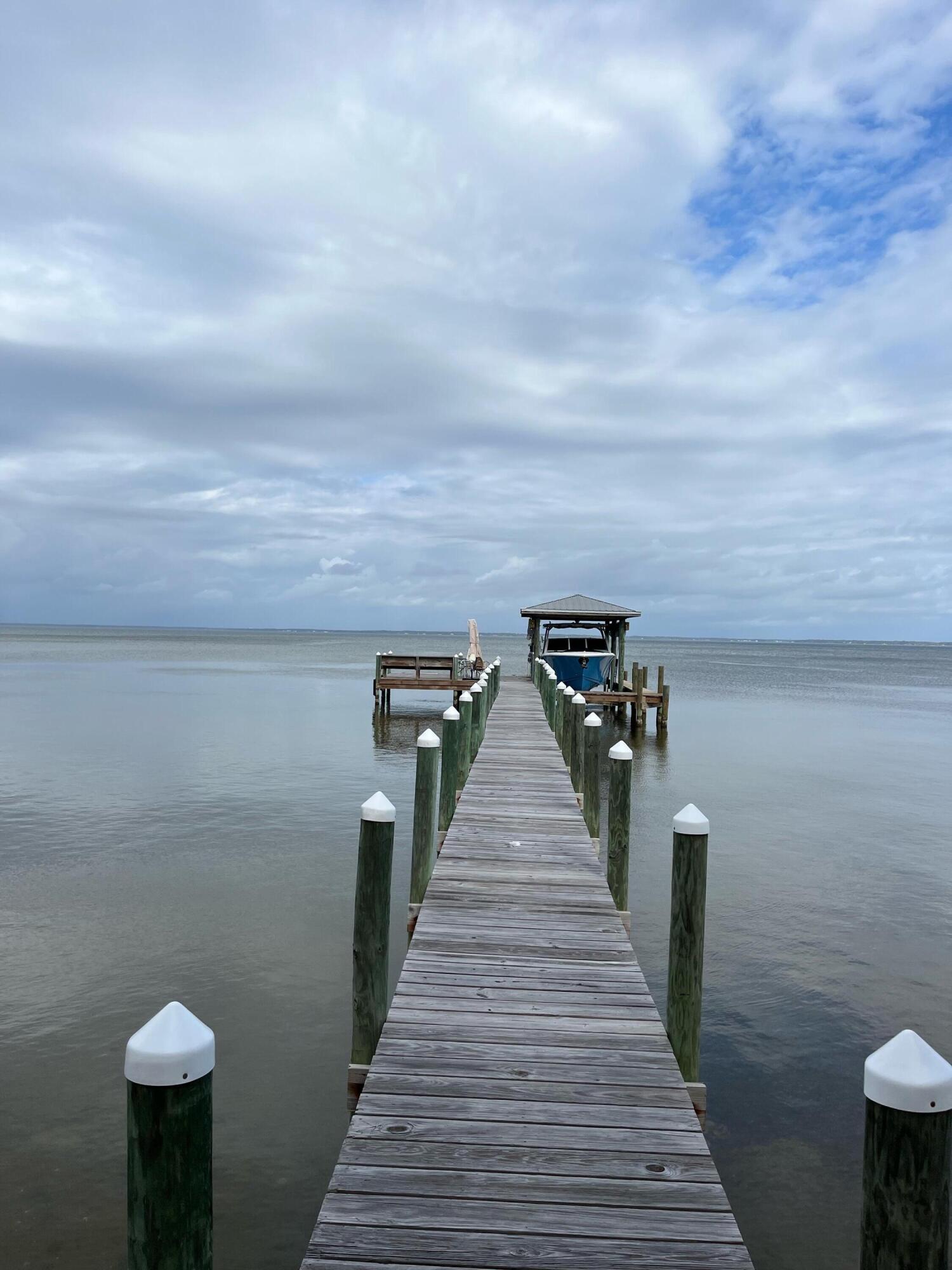 431 Pisces Drive Santa Rosa Beach, FL 32459 - Photo 7 of 19 a view of a balcony with wooden floor
