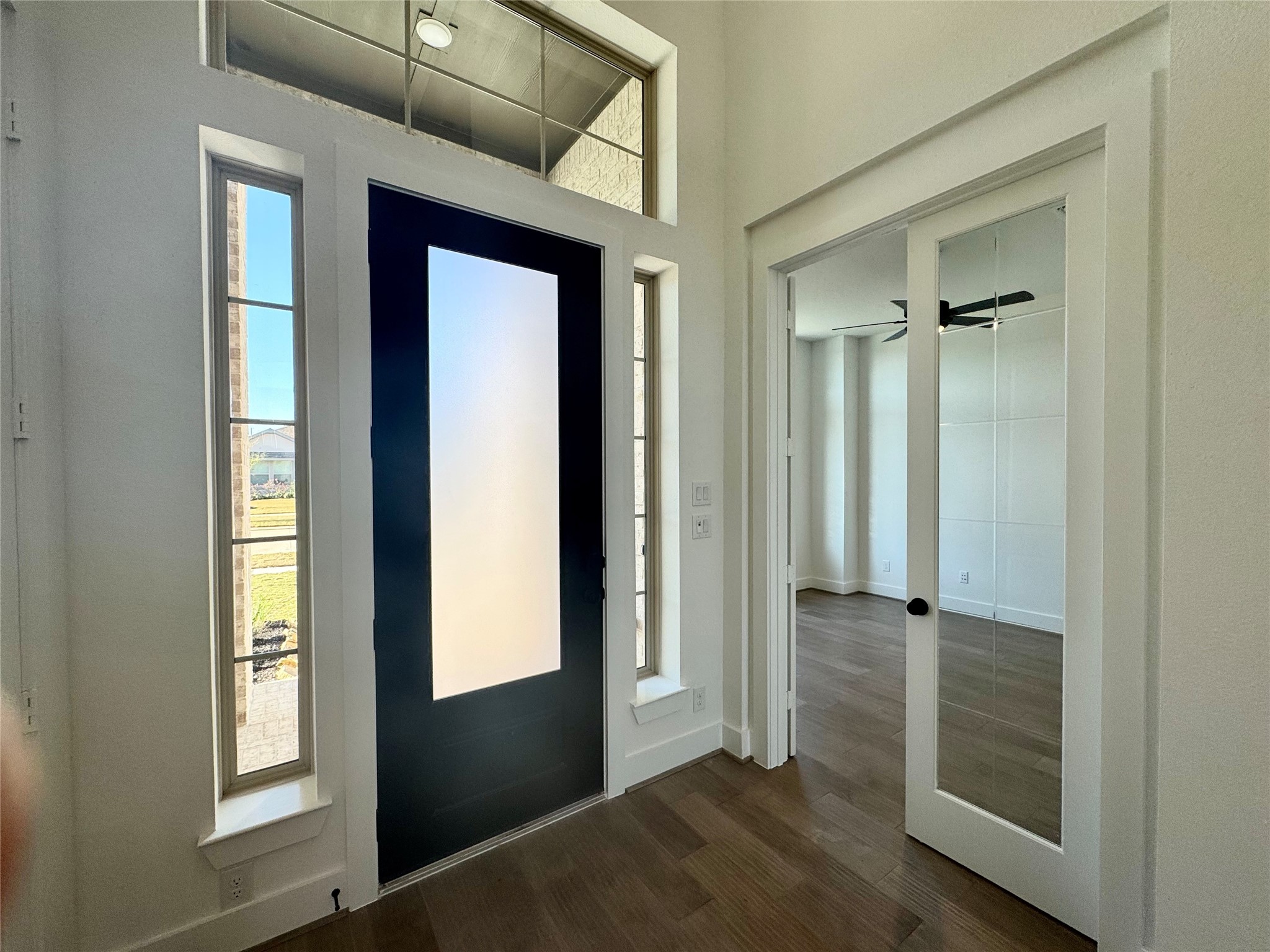 4307 Southpoint Way Fulshear, TX 77441 - Photo 2 of 18 a view of a room that has a large window