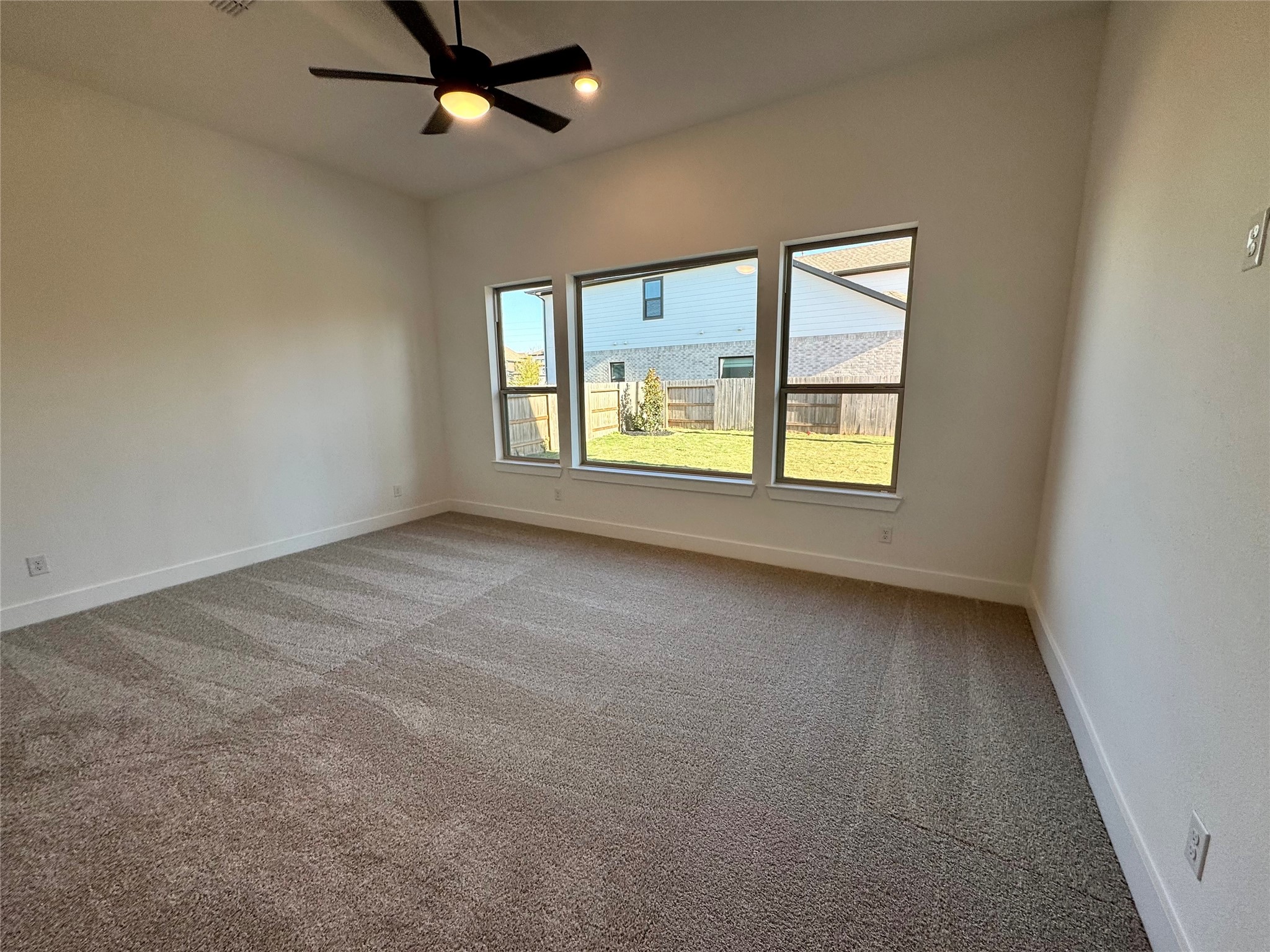 4307 Southpoint Way Fulshear, TX 77441 - Photo 6 of 18 an empty room with a window