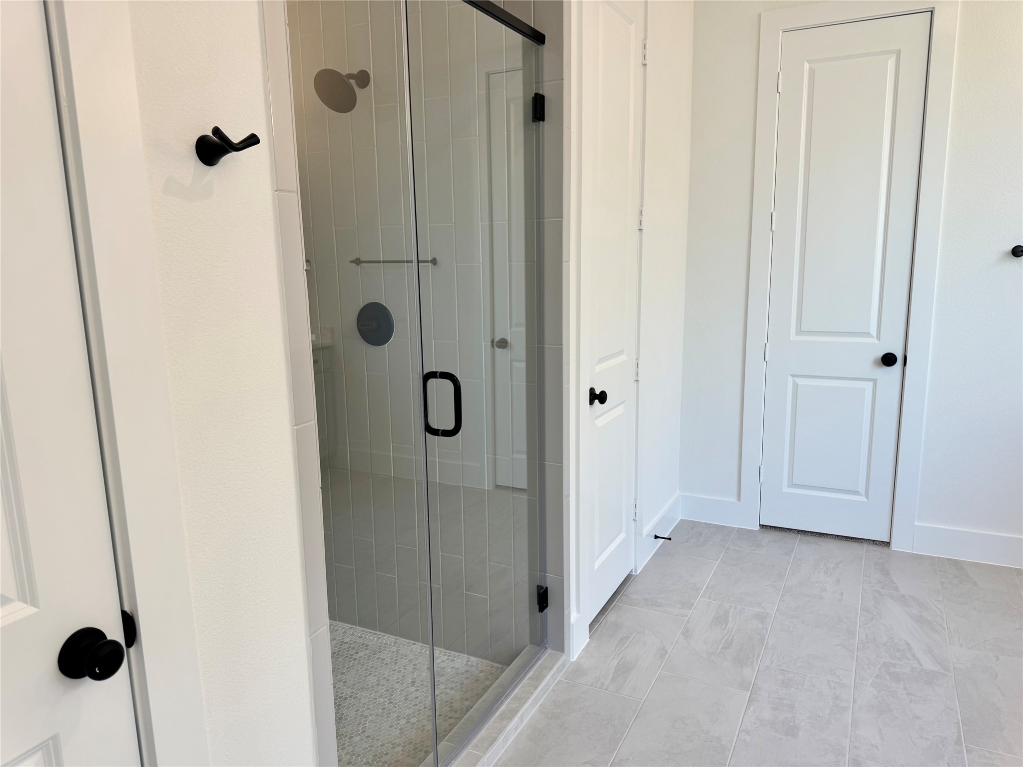 4307 Southpoint Way Fulshear, TX 77441 - Photo 8 of 18 a view of a bathroom from the shower