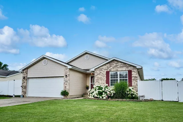 a front view of house with garden