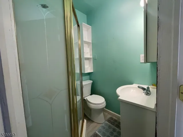 a bathroom with a toilet and a sink