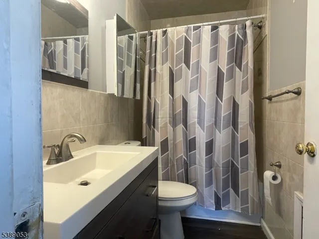 a bathroom with a sink and toilet
