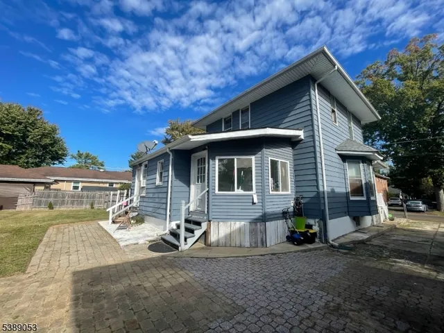 a view of backyard with outdoor space