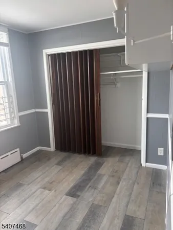 a view of a room with a wooden walls