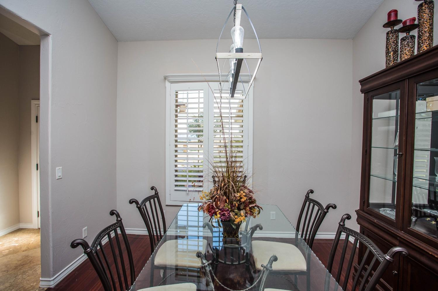 7516 66th Street Lubbock, TX 79407 - Photo 13 of 50 a view of a dining room with furniture window and outside view