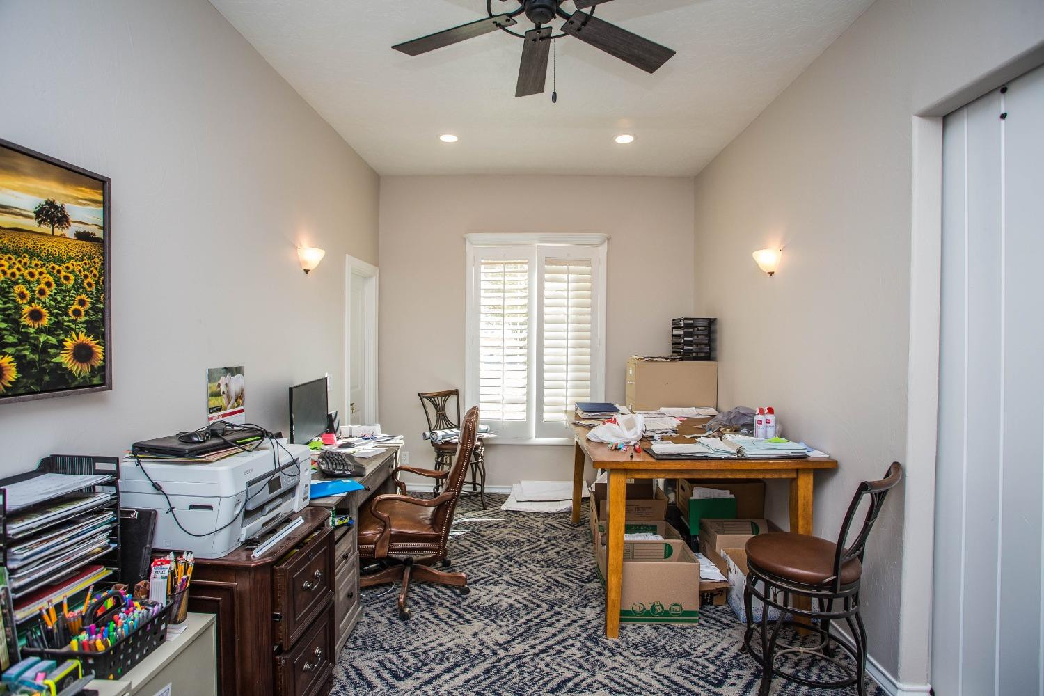 7516 66th Street Lubbock, TX 79407 - Photo 30 of 50 a view of a workspace with furniture