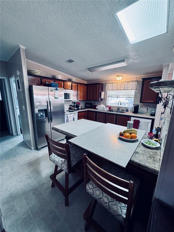 4339 Mackeral Circle Edgewater, FL 32141 - Photo 11 of 33 a room with furniture and a flat screen tv