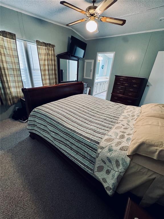 4339 Mackeral Circle Edgewater, FL 32141 - Photo 3 of 33 a bedroom with a large bed and a chandelier