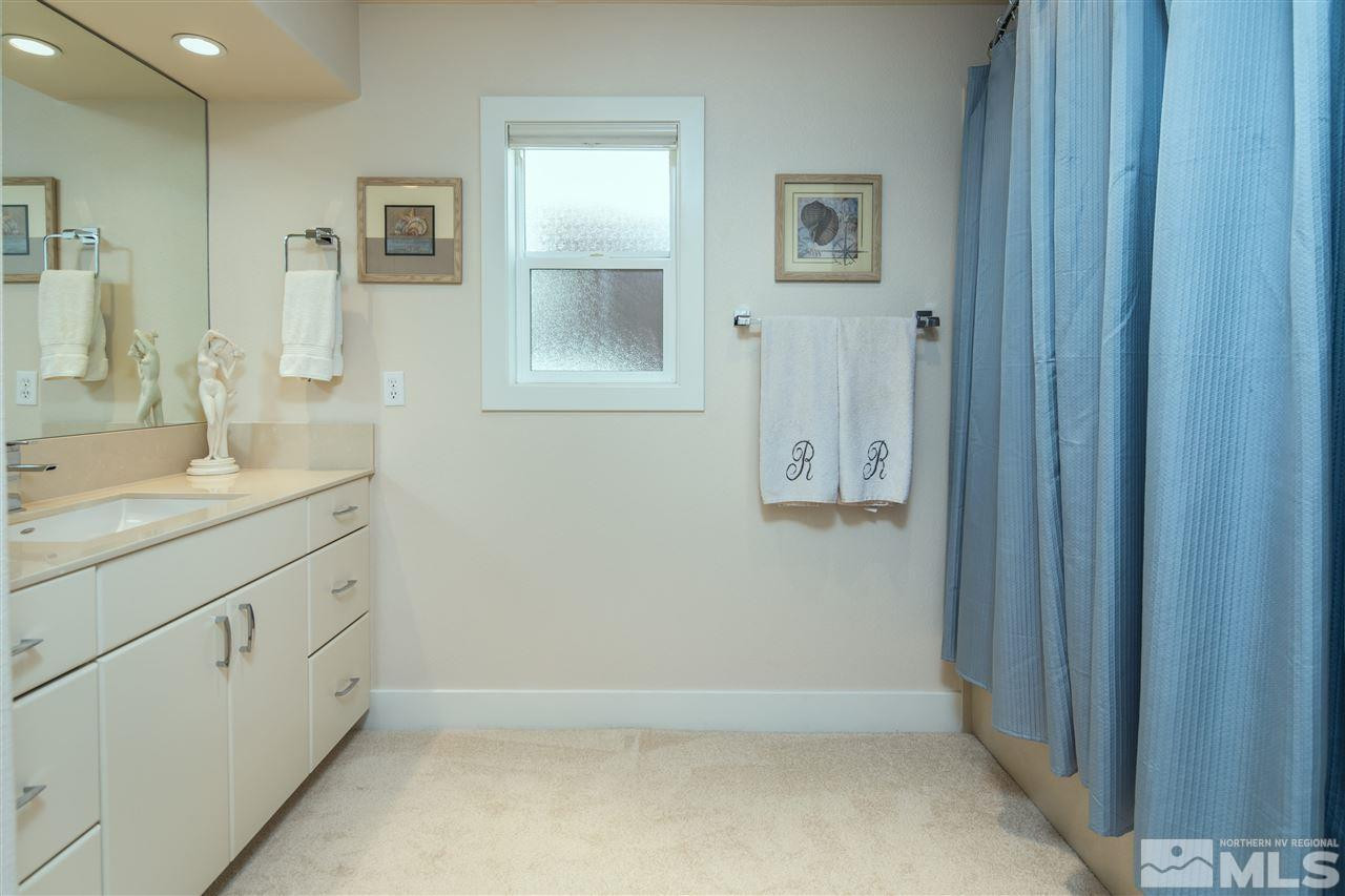 2769 Mountain Springs Road Reno, NV 89519 - Photo 15 of 25 a bathroom with a sink and a mirror