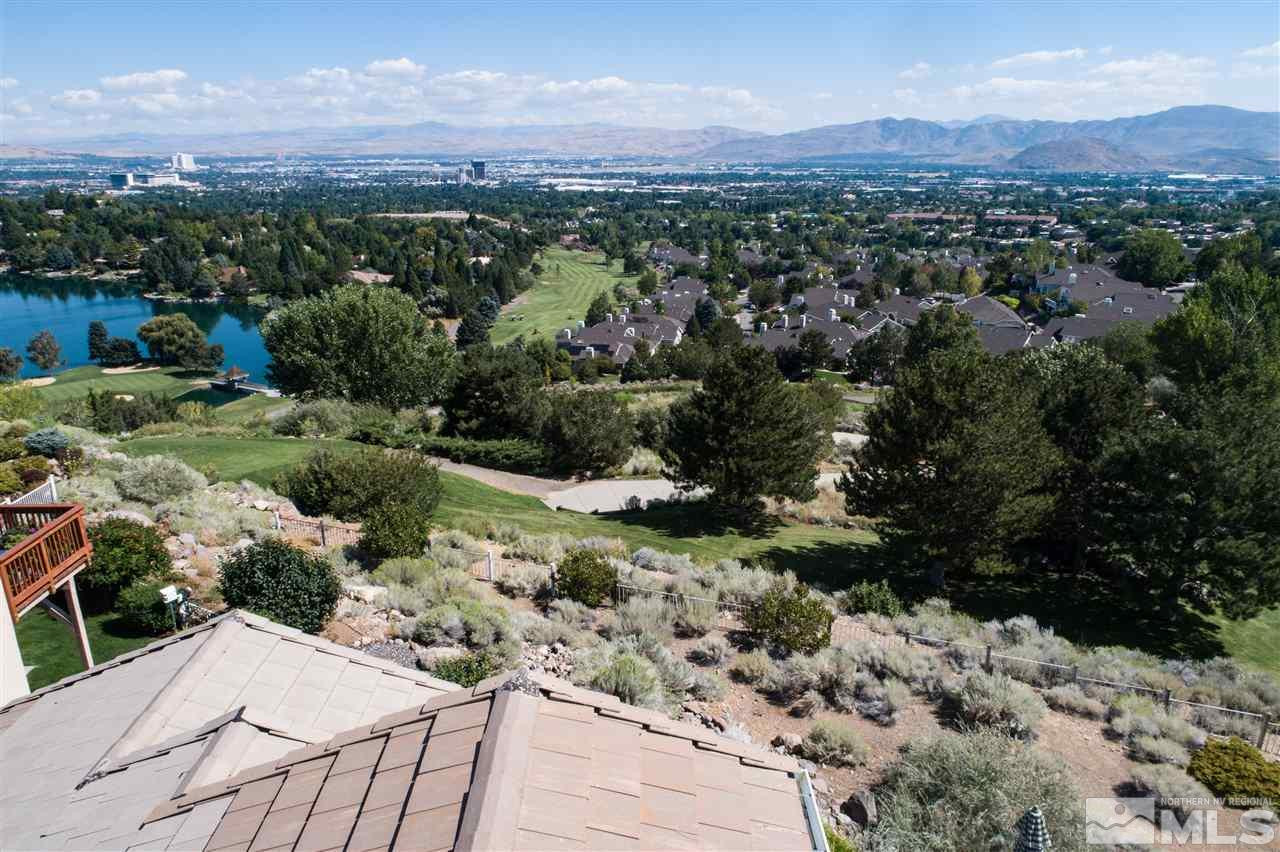 2769 Mountain Springs Road Reno, NV 89519 - Photo 23 of 25 a view of a forest with mountains in the background