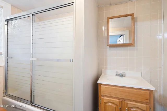 a view of an empty room with a sink