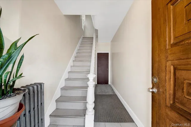 a view of staircase with wooden floor and stairs