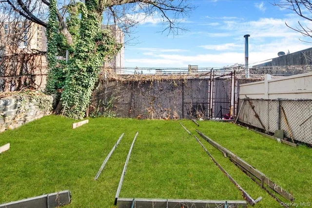 a view of a backyard with a garden