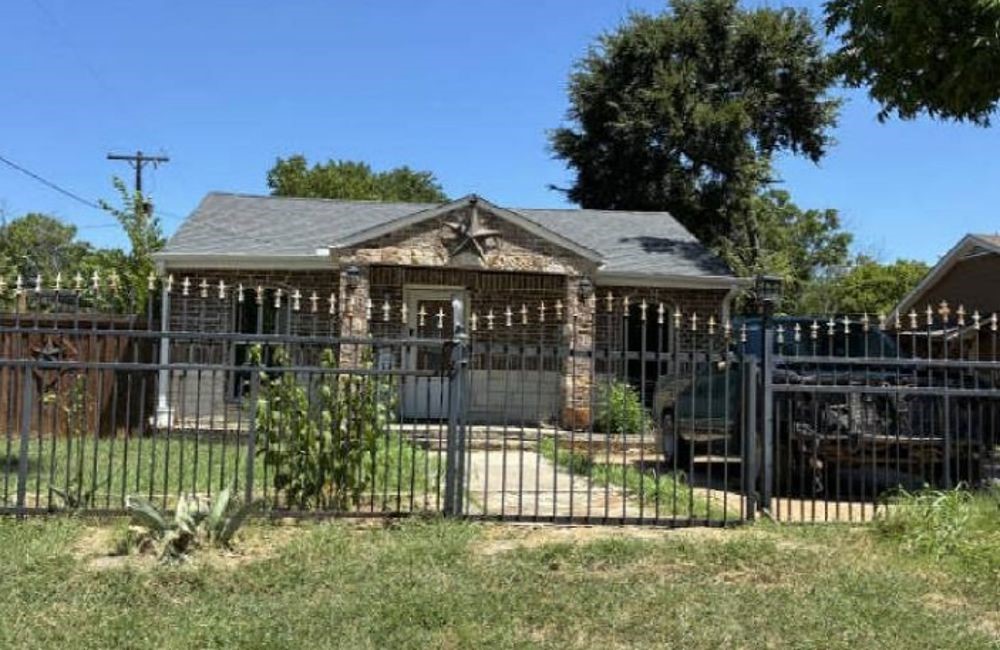 3701 Forbes Street Fort Worth, TX 76105 - Photo 1 of 6 a front view of a house with a garden