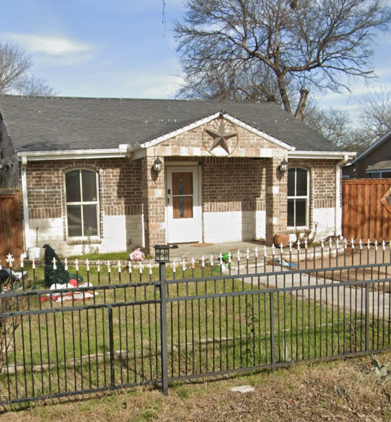 3701 Forbes Street Fort Worth, TX 76105 - Photo 6 of 6 a front view of a house with a garden