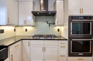 1029 Brandon Way Phoenix, OR 97535 - Photo 14 of 75 a kitchen with granite countertop a stove sink and cabinets