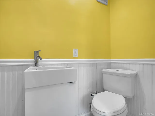 a bathroom with a sink and a toilet